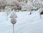Oblačno s kišom, poslije podne snijeg i pad temperature